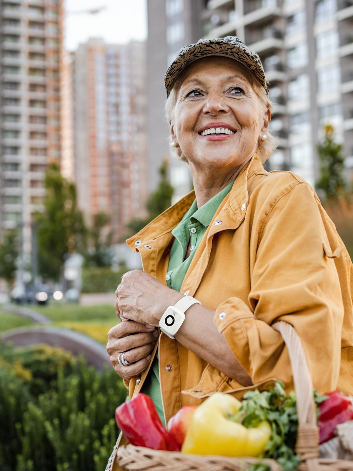 Woman at farmers marketing wearing Medical Alert Mini Mobile System bracelet