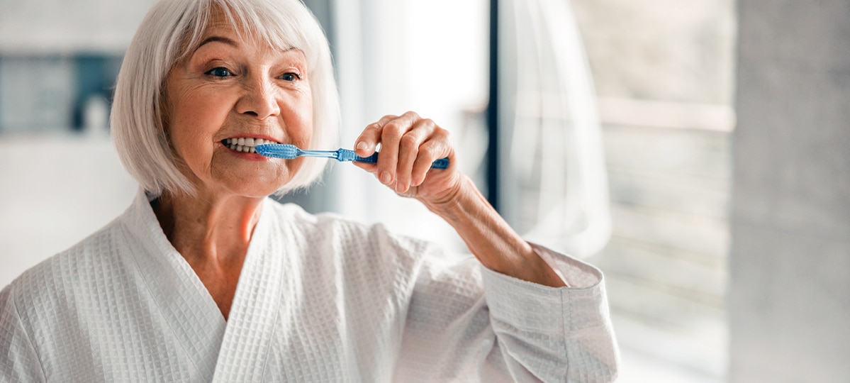 Woman Brushing Teeth