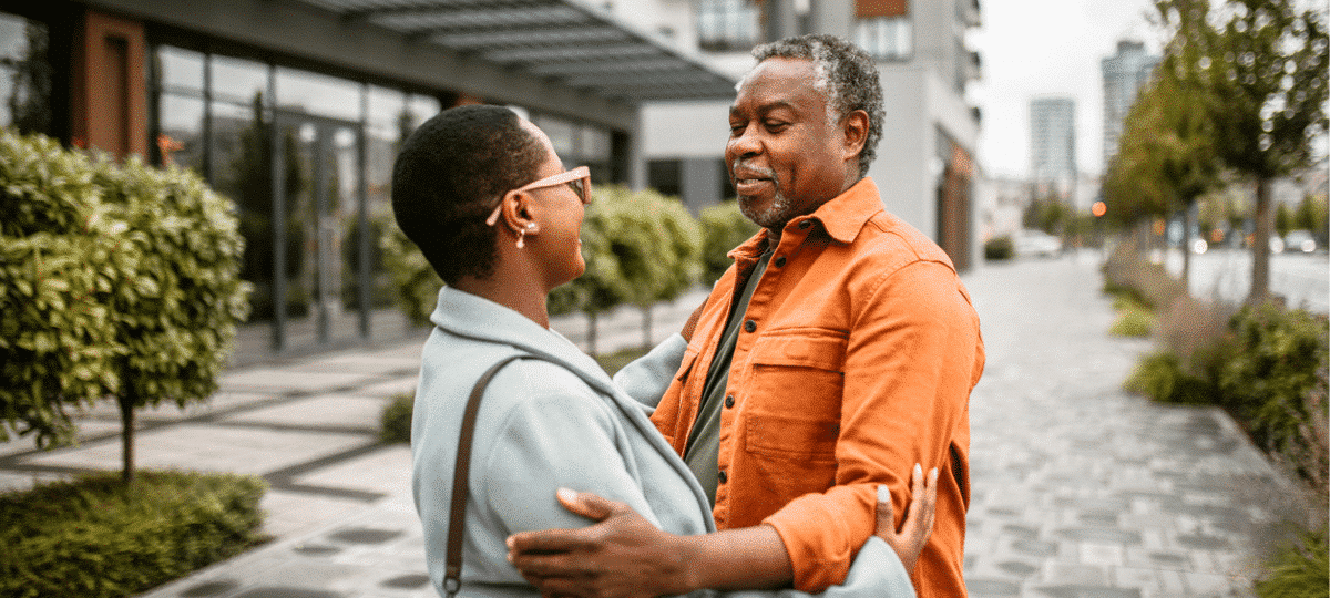 People Embracing In The Street