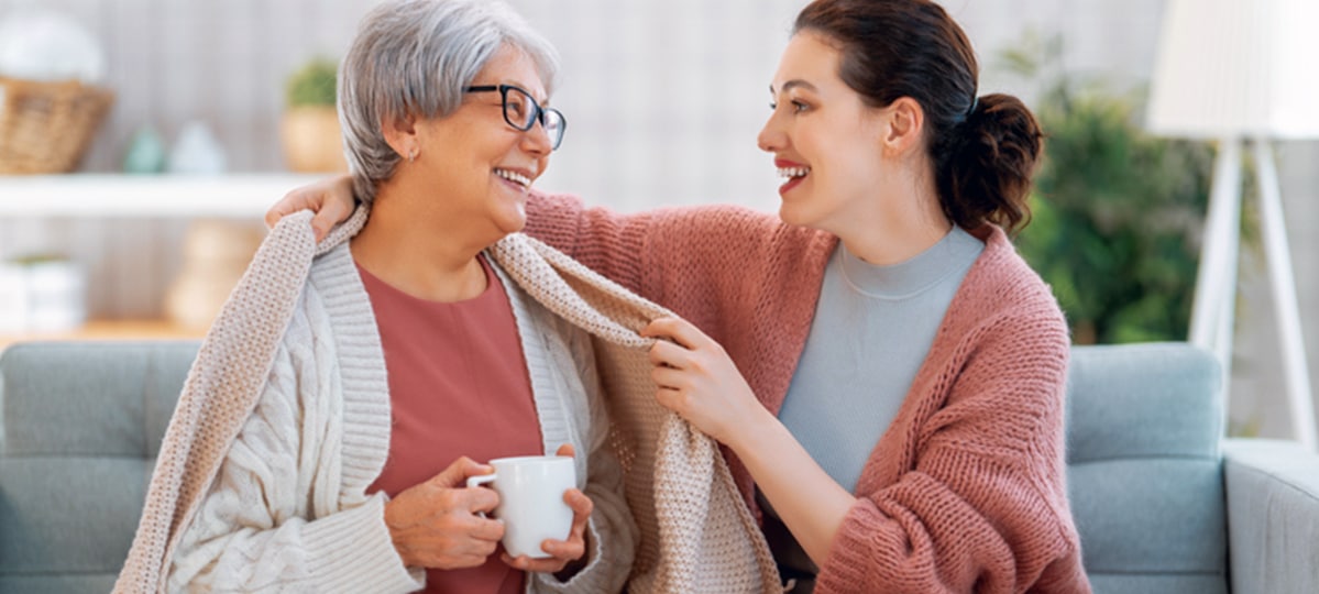 Mother Daughter On The Couch