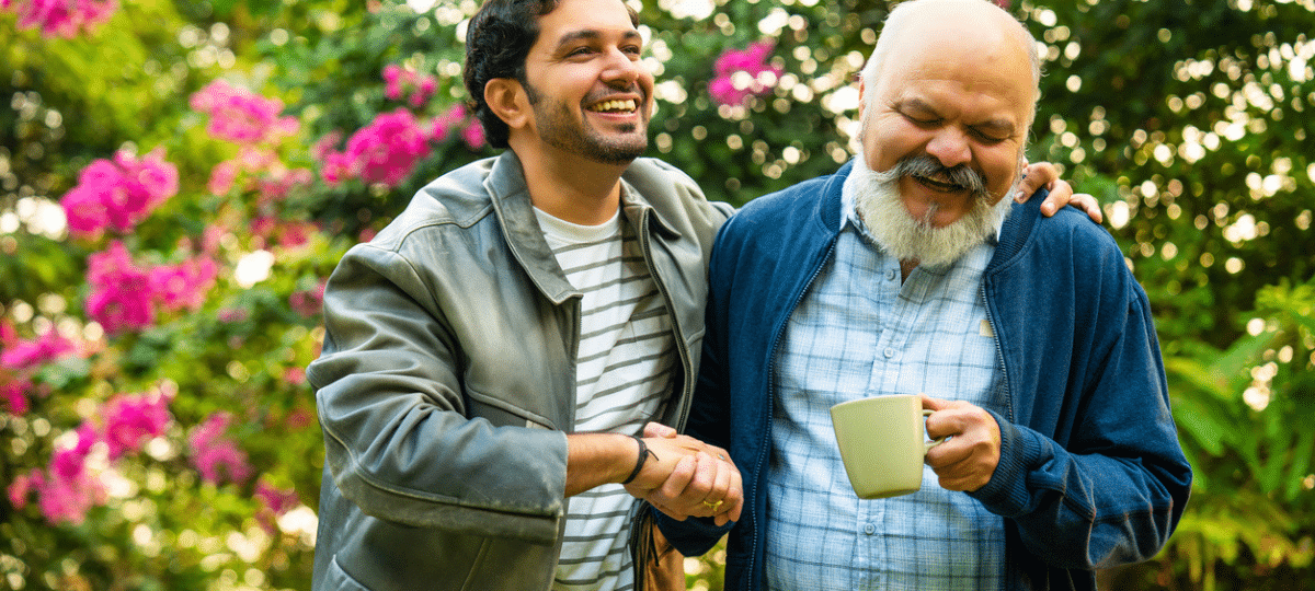 Senior father and son in garden