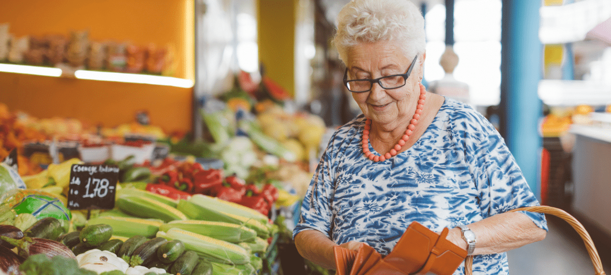 Woman buying vegetables